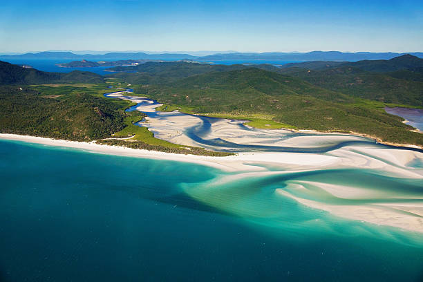 Would I be able to take a dip in the ocean at Airlie Beach?